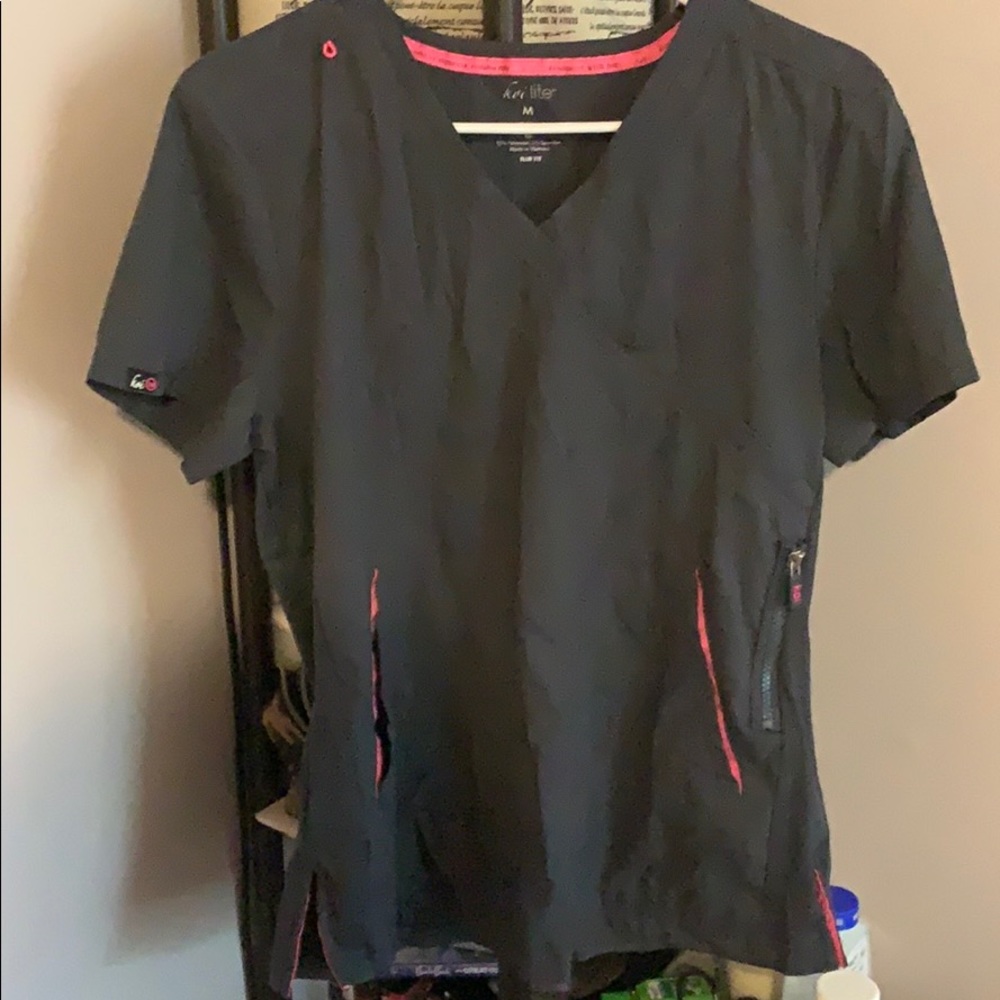 Koi medical scrub pants and shirt.